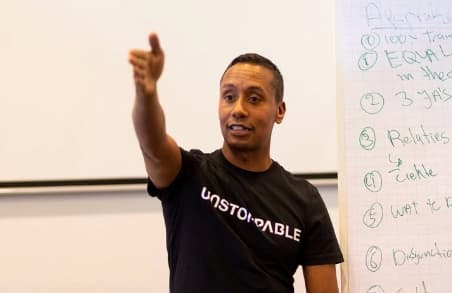 Virgil Brewster working through a flipchart with a room